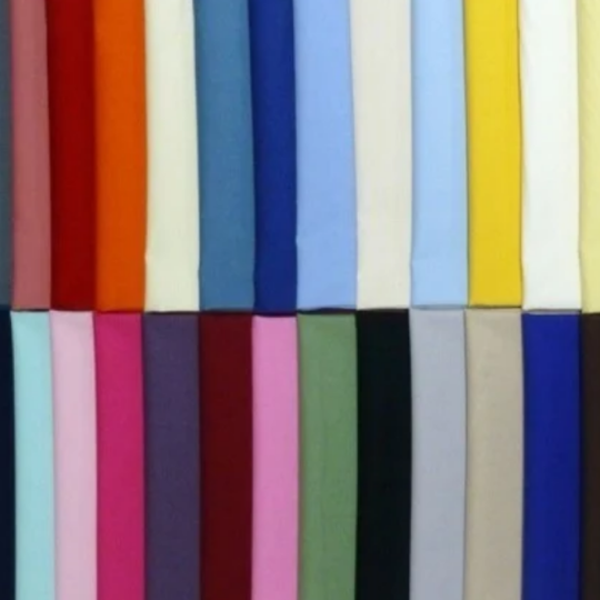 Dyed yarn packages prepared for weaving or knitting