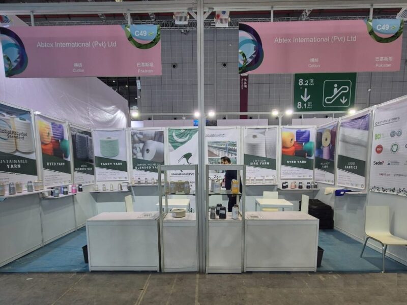 Abtex International (Pvt) Ltd exhibition booth C49 at Yarn Expo Shanghai 2025, Hall 8.2, displaying sustainable yarn, dyed yarn, fancy yarn, cotton blended yarn and juco fabrics
