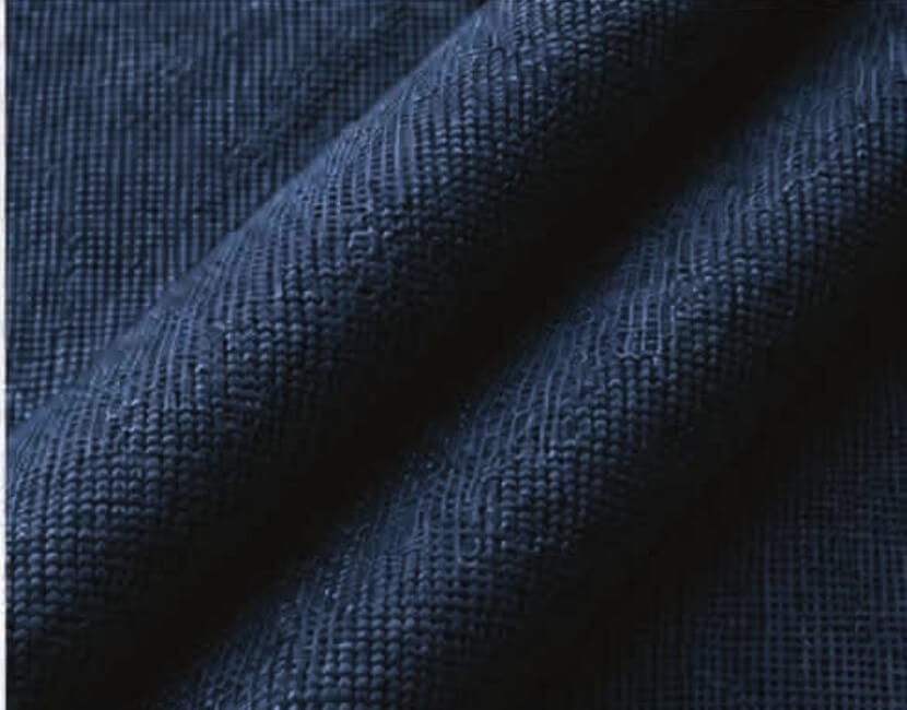 Close-up of navy blue canvas fabric texture