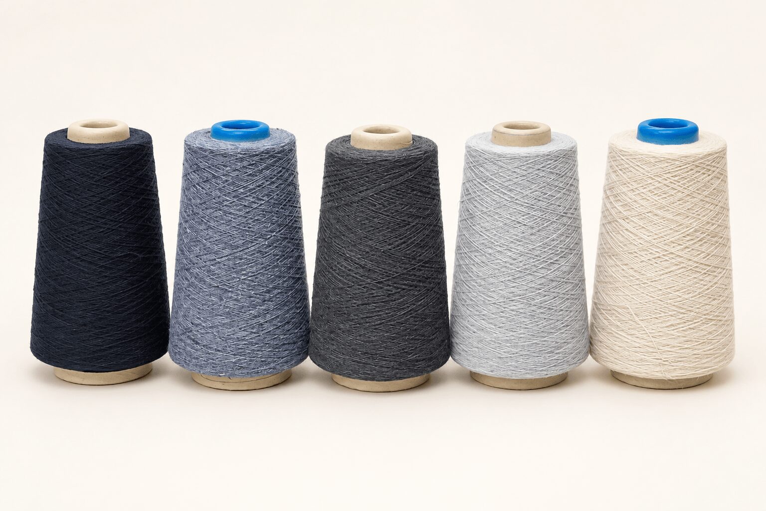 Recycled wool blended yarn cones supplied by Abtex International Pakistan